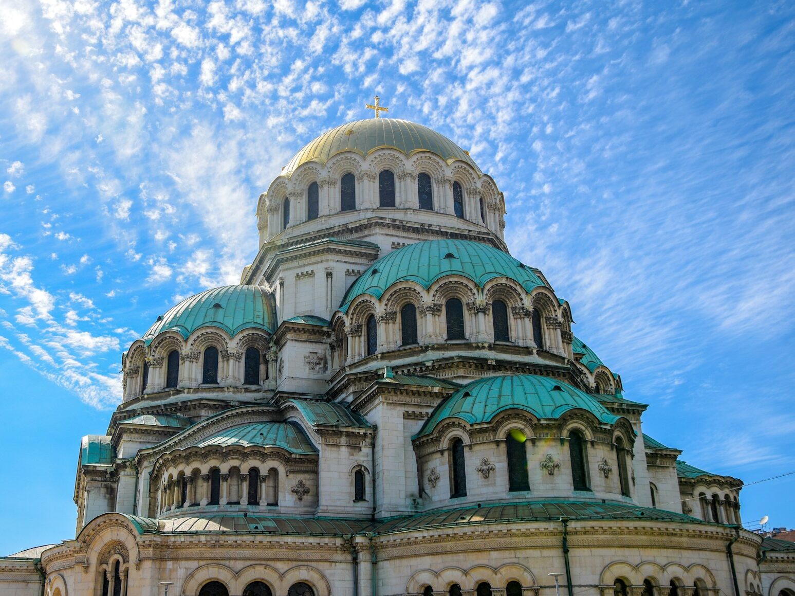green and blue dome building under blue sky during daytime