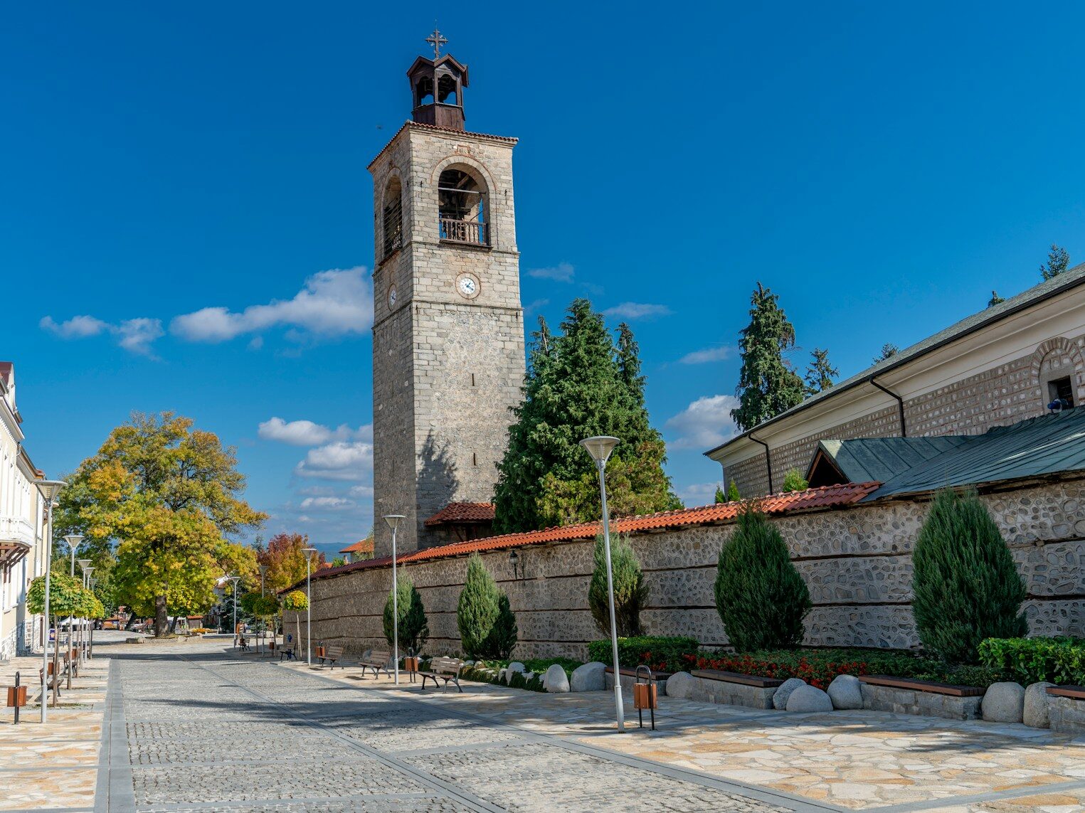 a tall clock tower towering over a city