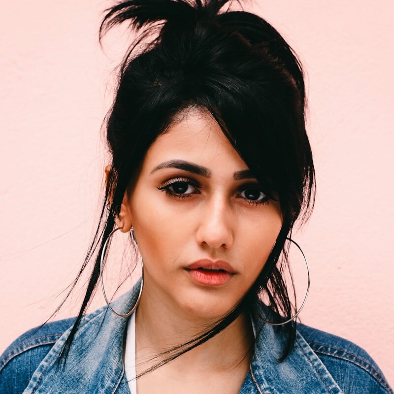 woman wearing blue denim jacket