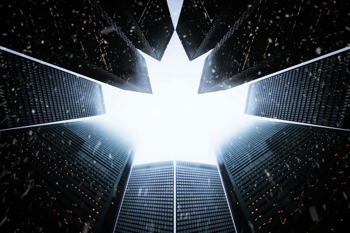 A striking low angle view of skyscrapers forming a maple leaf shape against the sky.