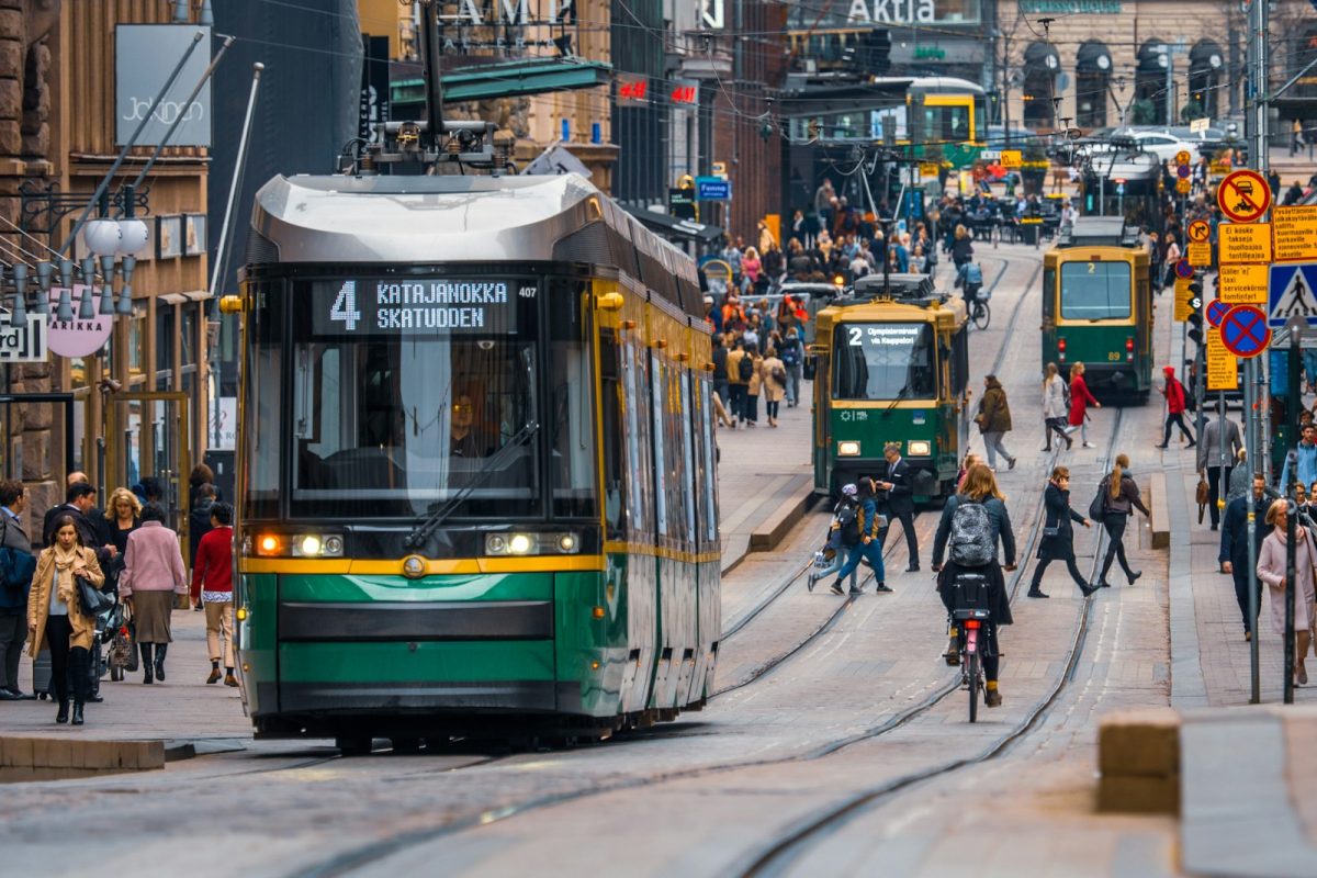 green and yellow city tram