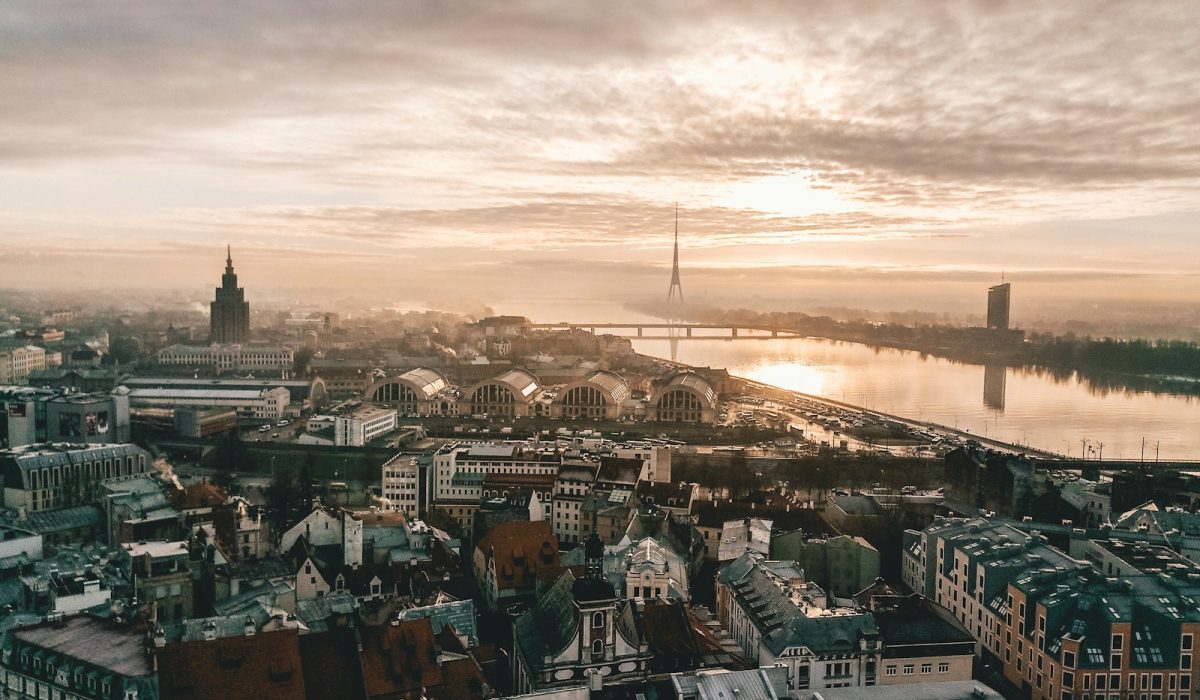 aerial photo of city under cloudy sky