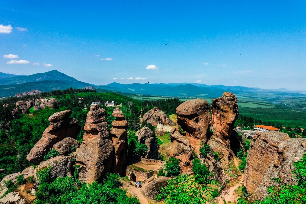 brown rock formation under blue sky during daytime