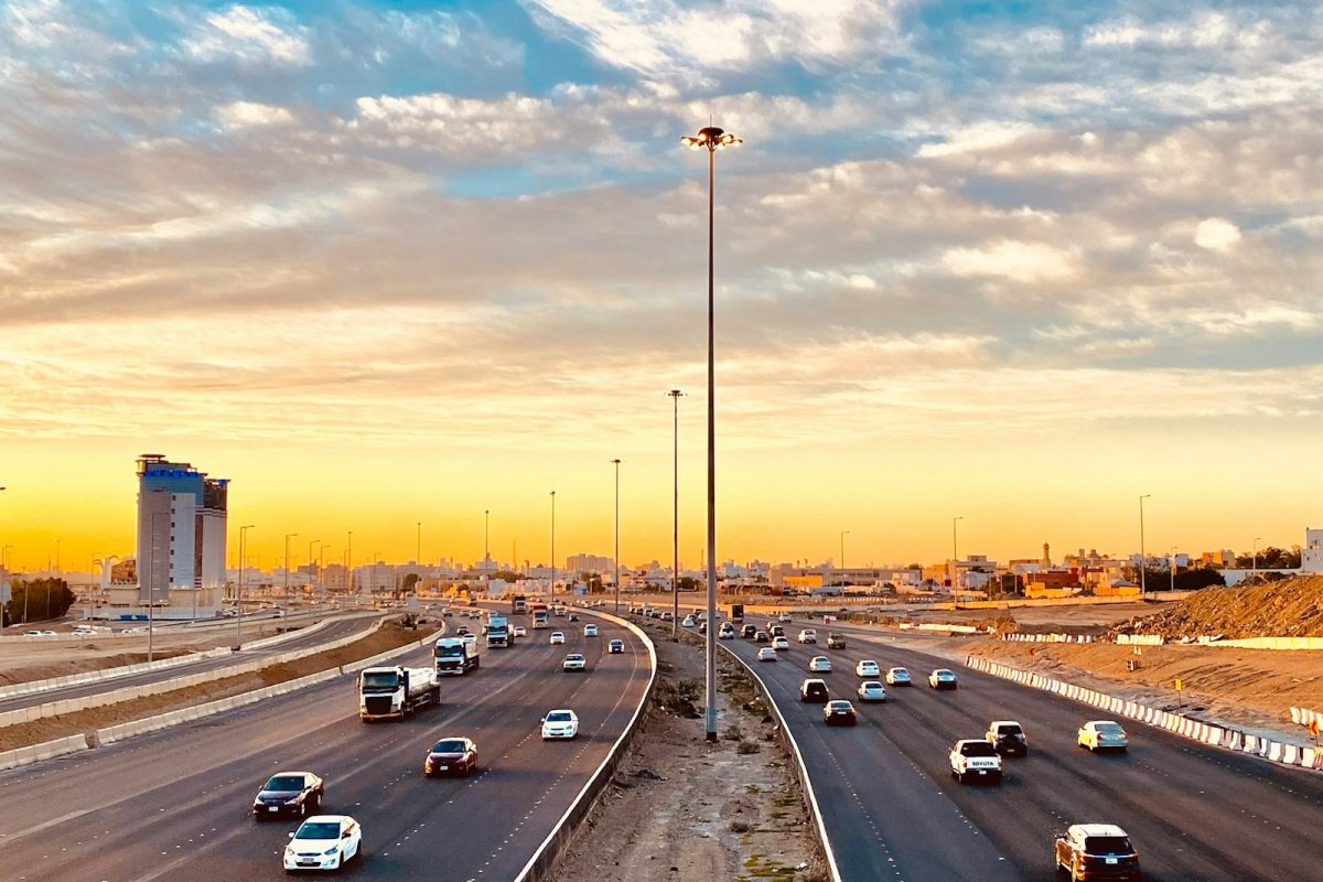 cars on road during sunset